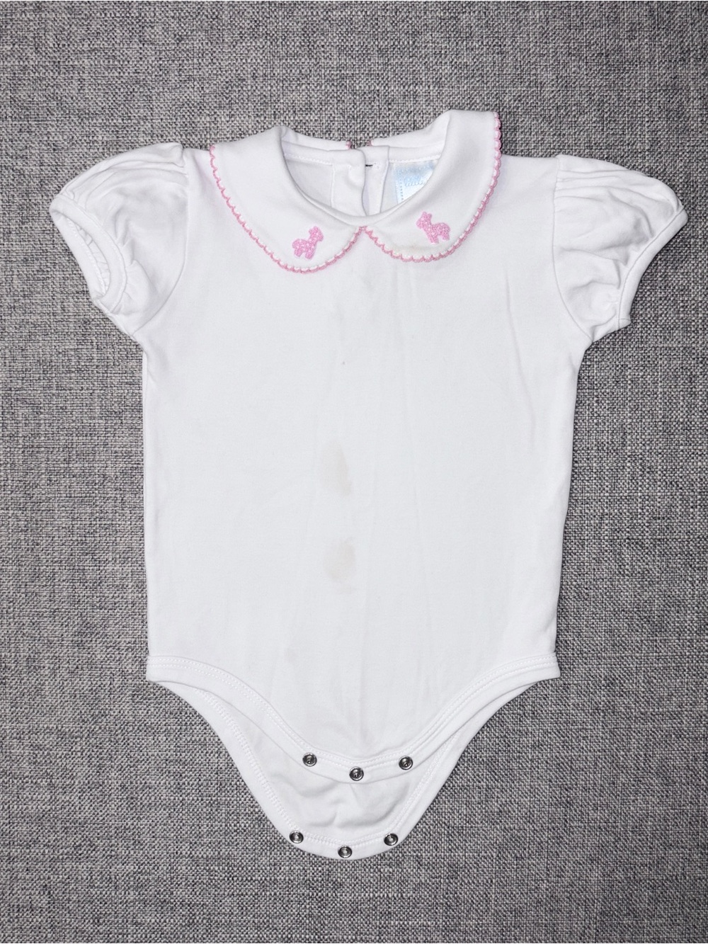 Little English 12m play condition for treated marks on front and neckline